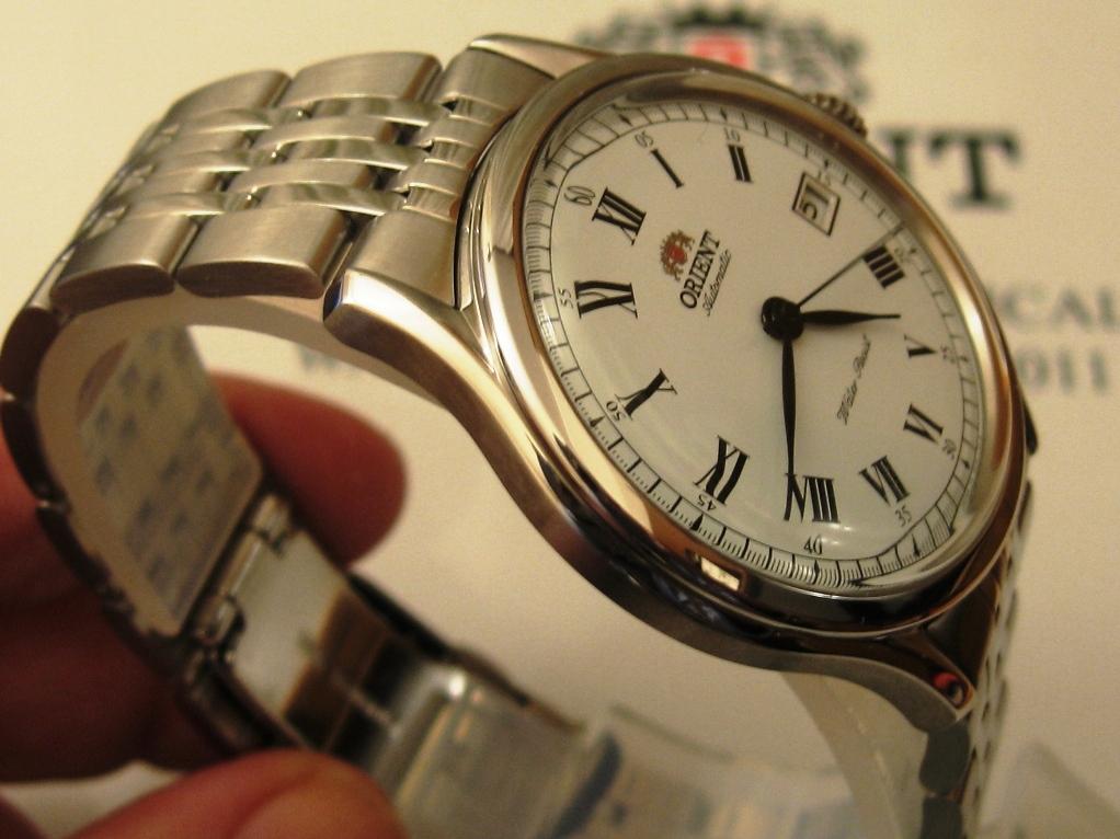Часы orient цены оригинал. Orient Automatic ser1r004w. Orient ser1y001w0. Ориент 46946. Orient ser1r001s.